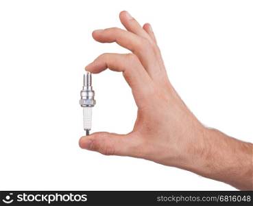 New sparking plug in a hand on a isolated background