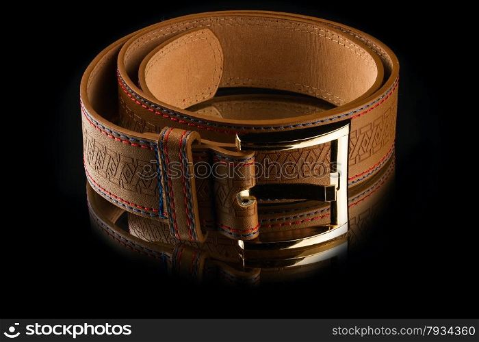 new stylish brown leather men&rsquo;s belt on mirror background