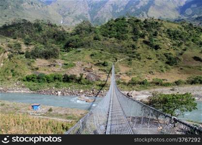 New suspension bridge in mountain, Nepal