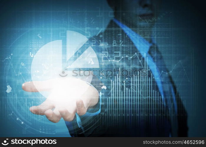 New technologies for business. Close up of businessman hand presenting digital market graphs