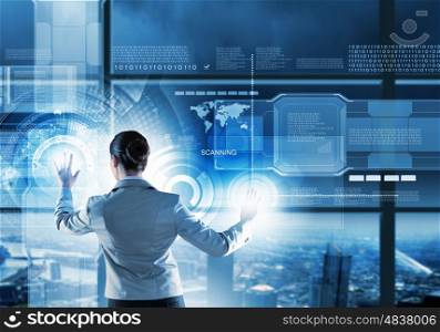 New technologies. Image of businesswoman pushing icon on media screen