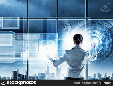 New technologies. Image of businesswoman pushing icon on media screen