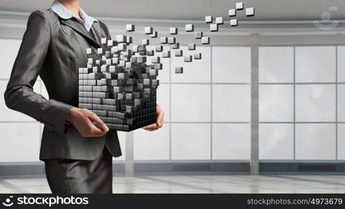 New technologies integration. Close view of businesswoman holding 3D illustration cube figure in hands