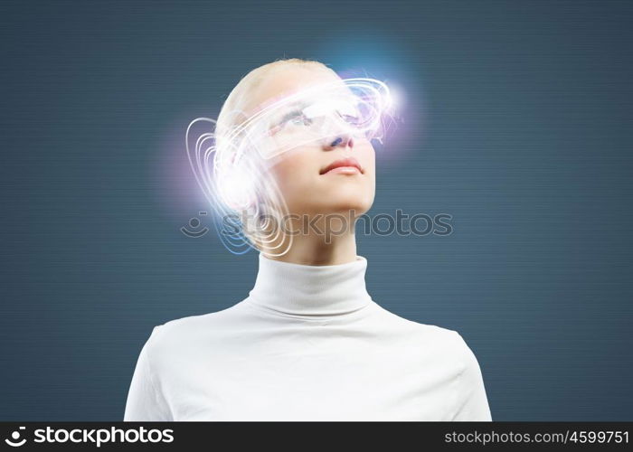 New technologies. Young woman in white against media background wearing headphones