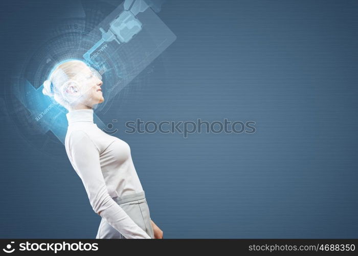 New technologies. Young woman in white against media background wearing headphones