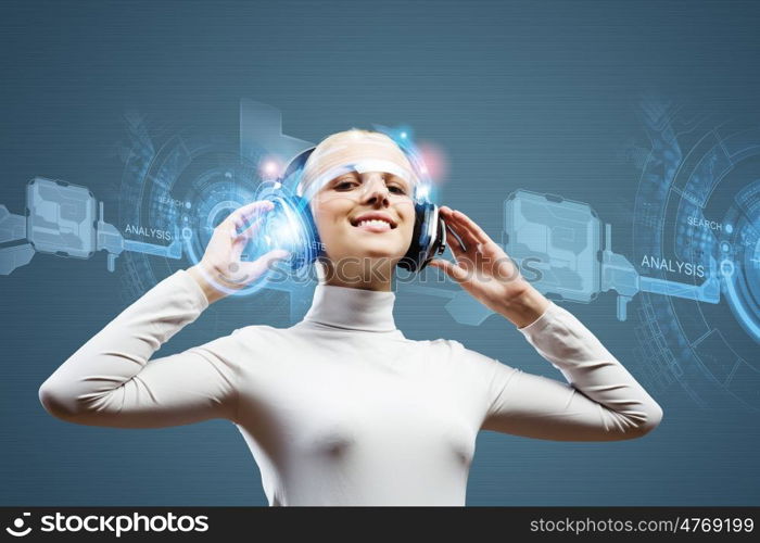 New technologies. Young woman in white against media background wearing headphones