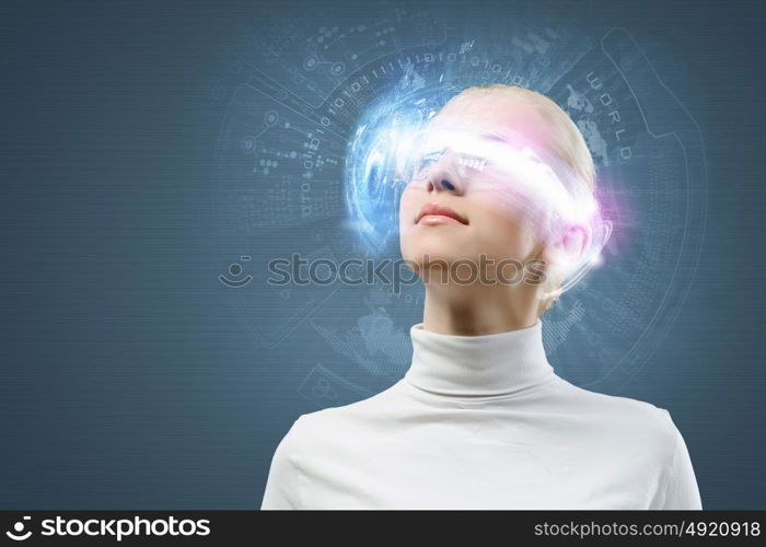 New technologies. Young woman in white against media background wearing headphones