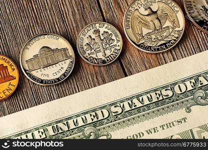 New uncirculated US money over wooden background