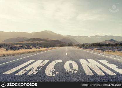 New way for your business. Conceptual image with word income on asphalt road