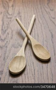 New wooden spoon on wooden table