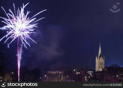 New year 2018. City view at Cesis, Latvia. Big masonry church is in city Cesis, little town. Urban travel photo. 01.01. 2018