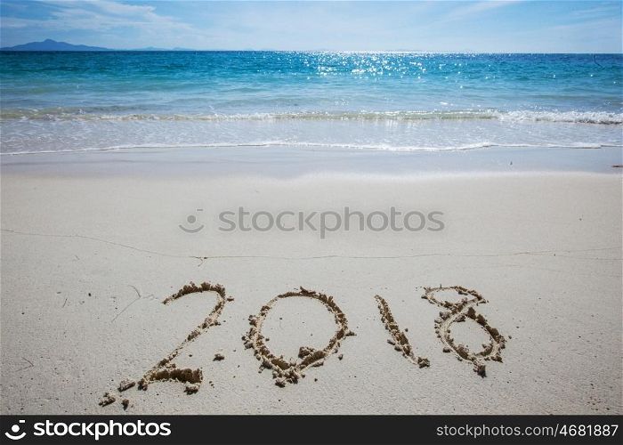 New year 2018 on beach. New year 2018 celebration on sea beach concept