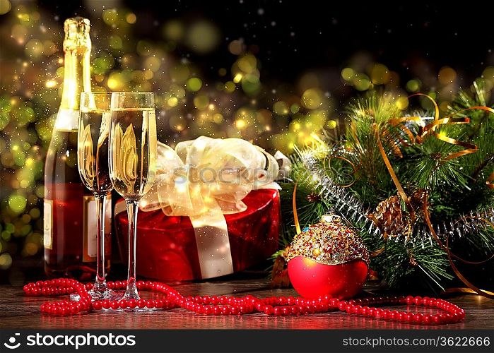 New Year&acute;s collage with glasses of champagne. Decorations and ribbons on a bright color background