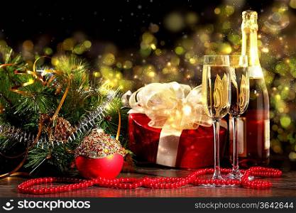 New Year&acute;s collage with glasses of champagne. Decorations and ribbons on a bright color background
