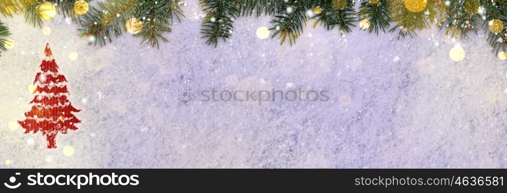 new year background on snow. christmas card or new year background made of spruce handwritten on snow with fir-tree branches and red craft paper