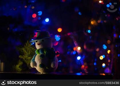 New year bokeh background. New year bokeh background with snowman