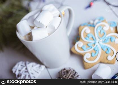 New Year card - cup of coffee and marshmallows. gingerbread and Christmas decorations