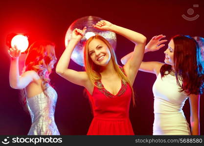 new year celebration, friends, bachelorette party, birthday concept - three beautiful woman in evening dresses dancing in the club