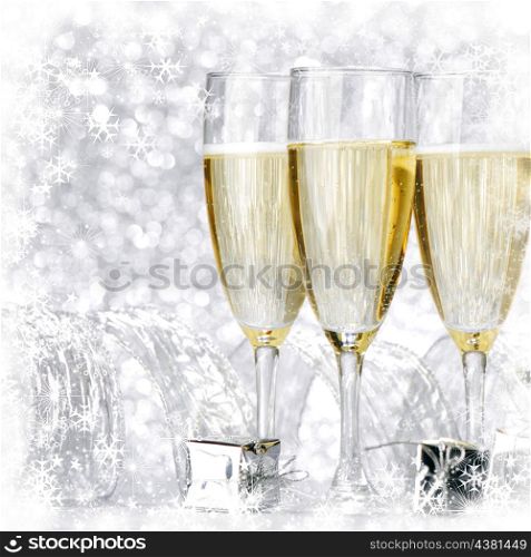 New year champagne and gifts with snowflakes and stars
