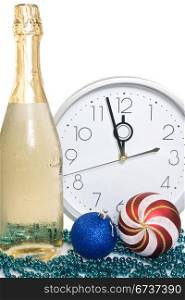 new year decoration.champagne, baubles and clock face.