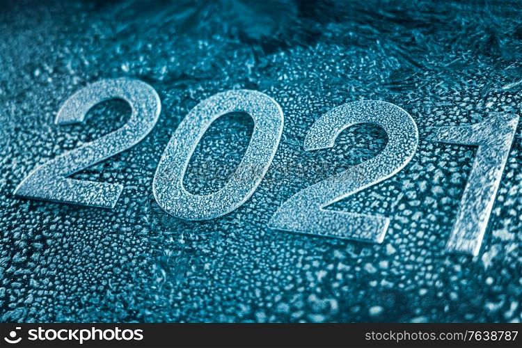 New Year&rsquo;s Eve 2021 Winter background - Frost pattern on the glass.