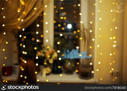 New Year&rsquo;s interior with lights bokeh