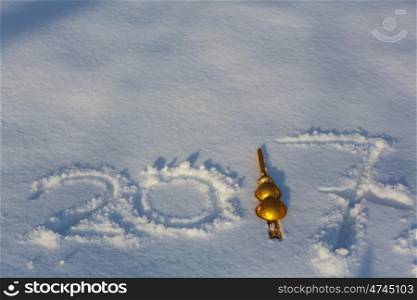 new years date 2017 written in snow background