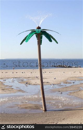 New York City, 15 september 2015: shower in the form of palm tree on beach of new york city coney island