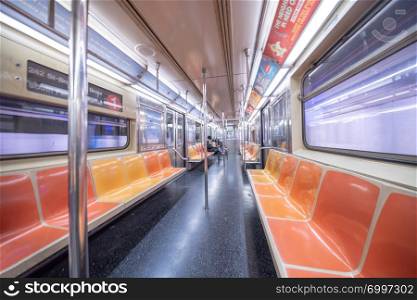 NEW YORK CITY - DECEMBER 2018: Interior of New York City subway train, wide angle view.