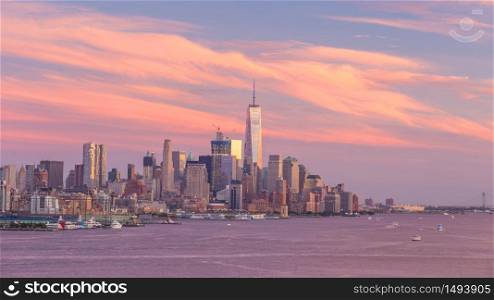 New York City downtown Manhattan sunset skyline panorama view over Hudson River in USA