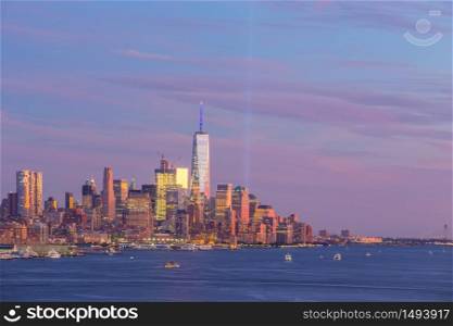 New York City downtown Manhattan sunset skyline panorama view over Hudson River in USA