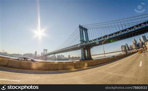 new york city manhattan bridge and skyline