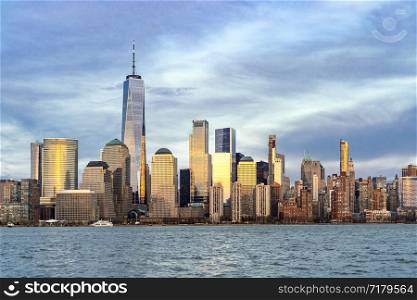 New York city Manhattan skyline cityscape at sunset from New Jersey.