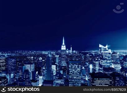 New York City Manhattan skyline panorama at night, USA