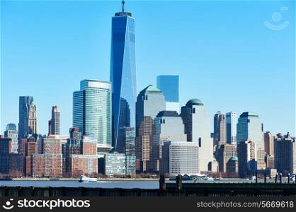 New York City Manhattan skyline with One World Trade Center Tower (AKA Freedom Tower) over Hudson River viewed from New Jersey