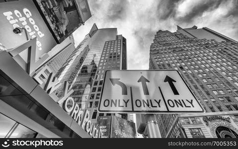 NEW YORK CITY - NOVEMBER 30, 2018: Times Square ads on a winter day. Times Square is a major tourist attraction in Manhattan.