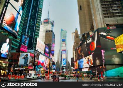 NEW YORK CITY - SEPTEMBER 04: Times square with people in the morning on October 4, 2015 in New York City. It&rsquo;s major commercial intersection and neighborhood in Midtown Manhattan at the junction of Broadway and 7th Avenue.