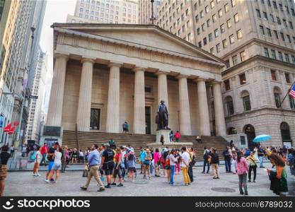 NEW YORK CITY - SEPTEMBER 3: Federal Hall National Memorial on Wall Street with people on September 3, 2015 in New York City.