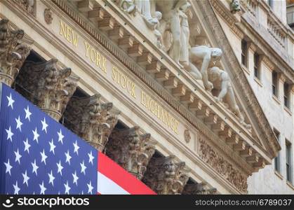 NEW YORK CITY - September 3: New York Stock Exchange building on September 3, 2015 in New York. The NYSE trading floor is located at 11 Wall Street and is composed of 4 rooms used for facilitation of trading.