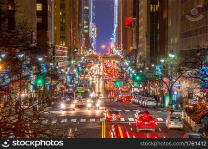 NEW YORK CITY, UNITED STATES ? DECEMBER 22, 2015. Night Traffic on 42nd Manhattan Street. Lights of car headlights, traffic lights and street lamps. Editorial use only.