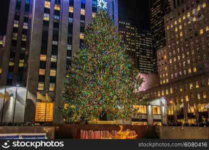 New York - DECEMBER 20, 2013: Christmas Tree at Rockefeller center on December 20 in USA, New York. Christmas Tree at Rockefeller center is the most famous christmas tree in USA