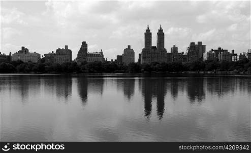 New York Skyline reflected in Central Park lake.
