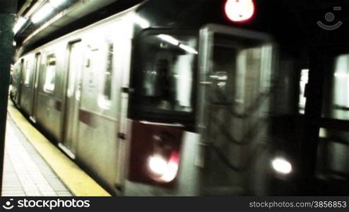 New York Subway Train Arrival. Great for themes of Urban, Transportation, Mass Transit, Lifestyles, New York, Commuting, Work, Business, Life, City, Modern, Society, Relationships