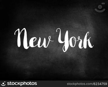 New York written on a chalkboard
