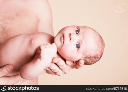 Newborn baby girl in the fathers&#39; hands