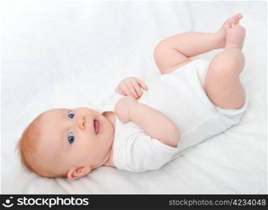 Newborn Baby Lying on Back on White Background