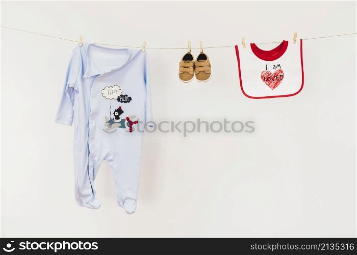 newborn concept with clothesline