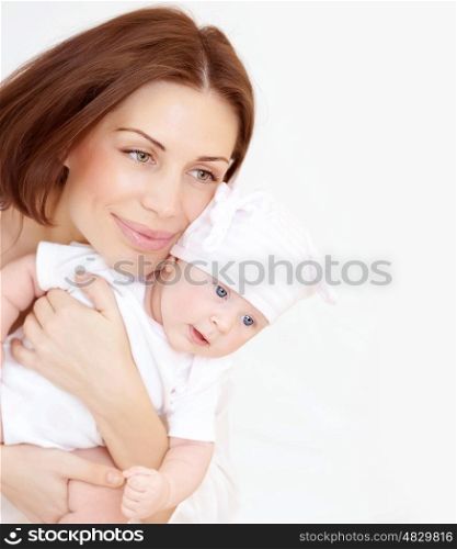 Newborn healthy infant with beautiful mom, enjoying family, new life, together at home, love and tenderness concept