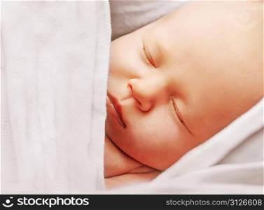 Newborn sleeping in the sling