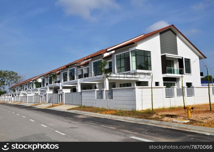 Newly built terrace house under the blue skies. Terrace house under the blue skies